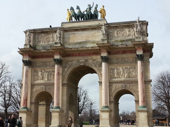 Napoleon built the Arc de Triomphe for his troops to ride through on their glorious return from battles. It was finished in time so this little arc was thrown up quickly and sufficed. A straight view through this arc and you can see the Arc de Triomphe.