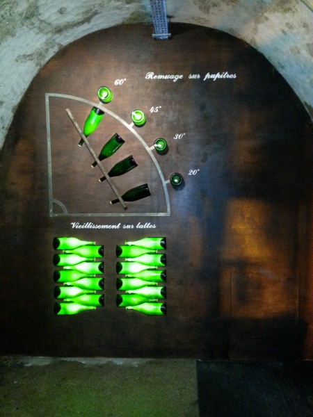 A demonstration of how bottles are turned during the process