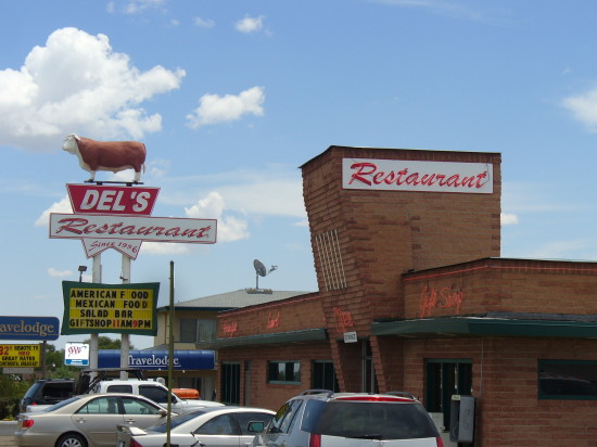 Seriously - how can you not stop to have lunch at a place where there is a huge cow on top of the sign?