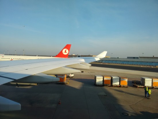 Wing span of Lufthansa - waiting to take off from Frankfurt.