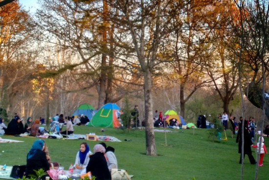 Pop-up tents are hugely popular for picnics in the park, in Tehran.