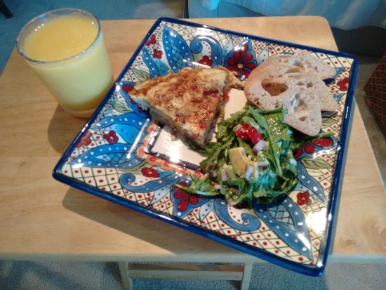 My version of the Spanish Tortilla served with an arugula salad and bread. And a delightful mango margarita.